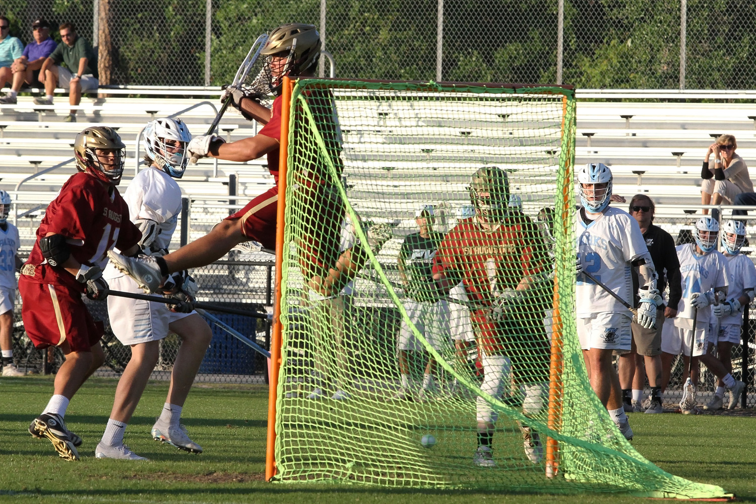 Jack Dowd of Ponte Vedra beats the St. Augustine goalie low as the keeper goes high, attempting to block the shot.